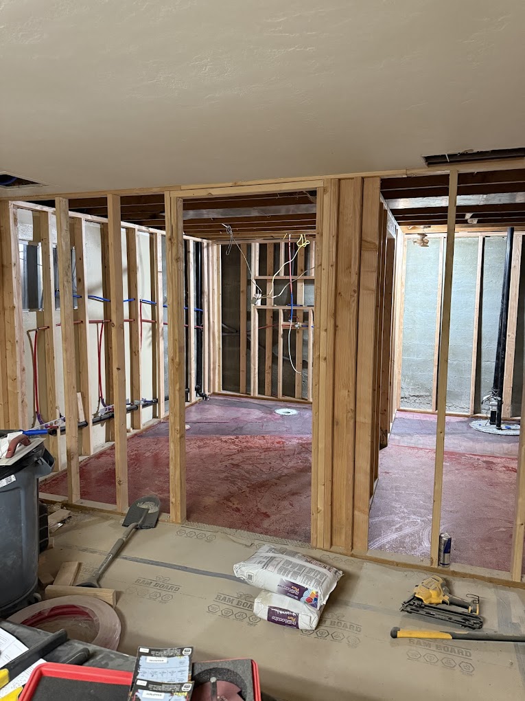 Interior framing and rough-in for a custom basement remodel